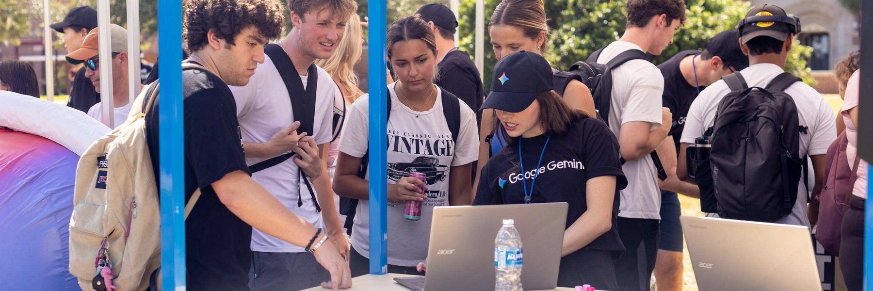 FSU students interacting with Google reps outside under a tent