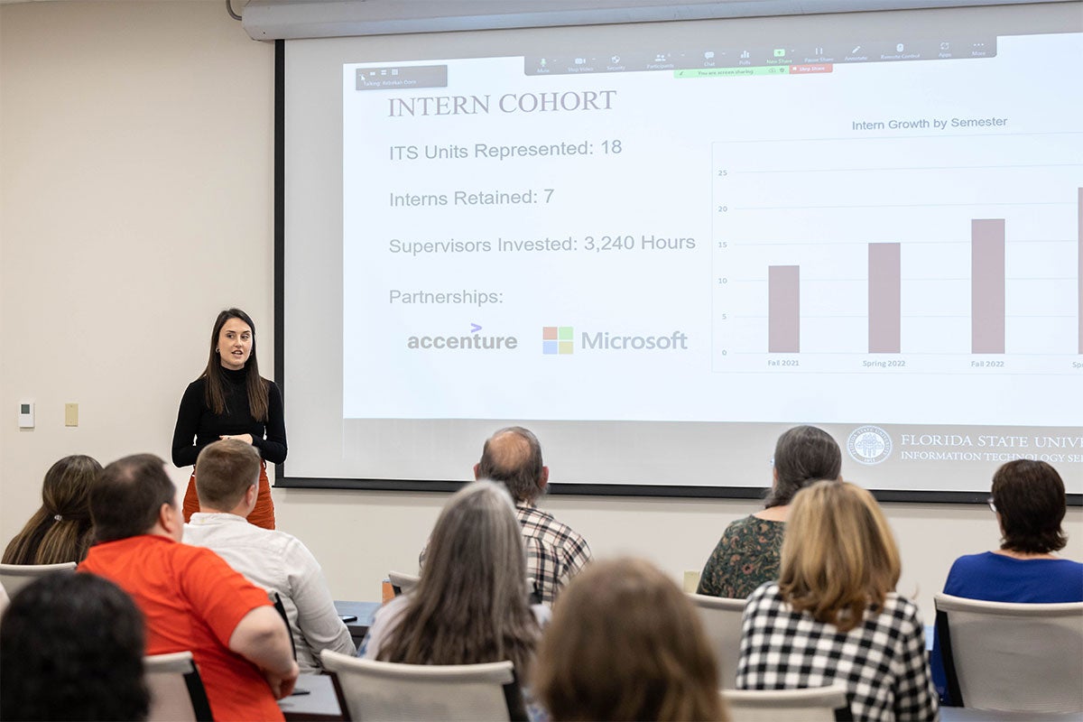 Female ITS staff member presenting.