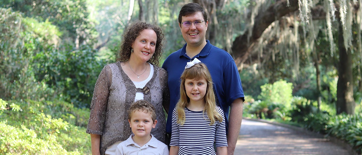 Family photo of Chris Cloud, wife and two kids